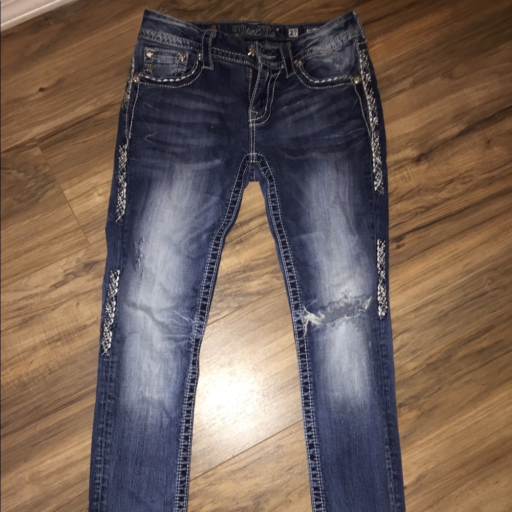 Size 27 light distressed miss me jeans.
